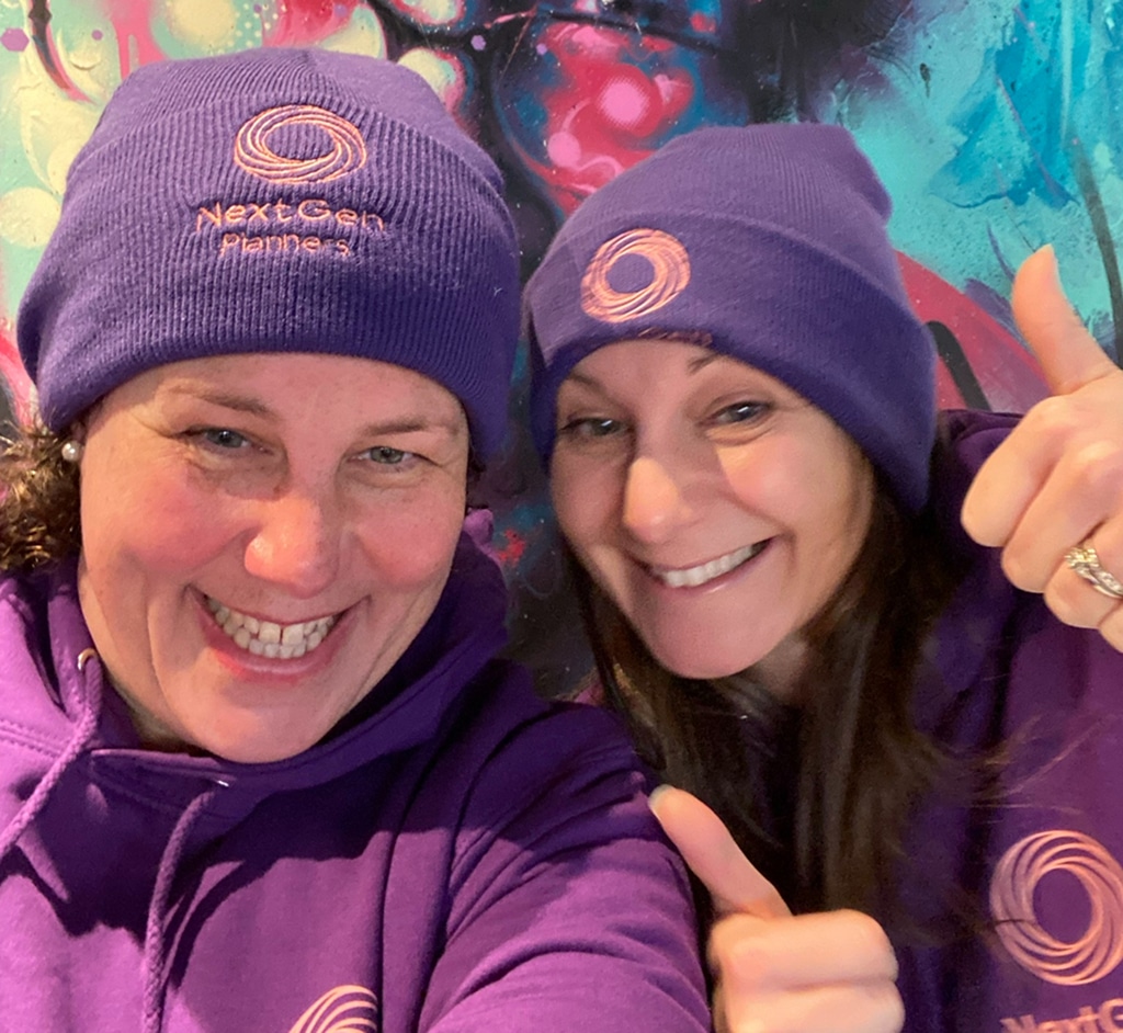 Nicola Ellis & Jennifer Ellis sporting Nextgen planners merchandise