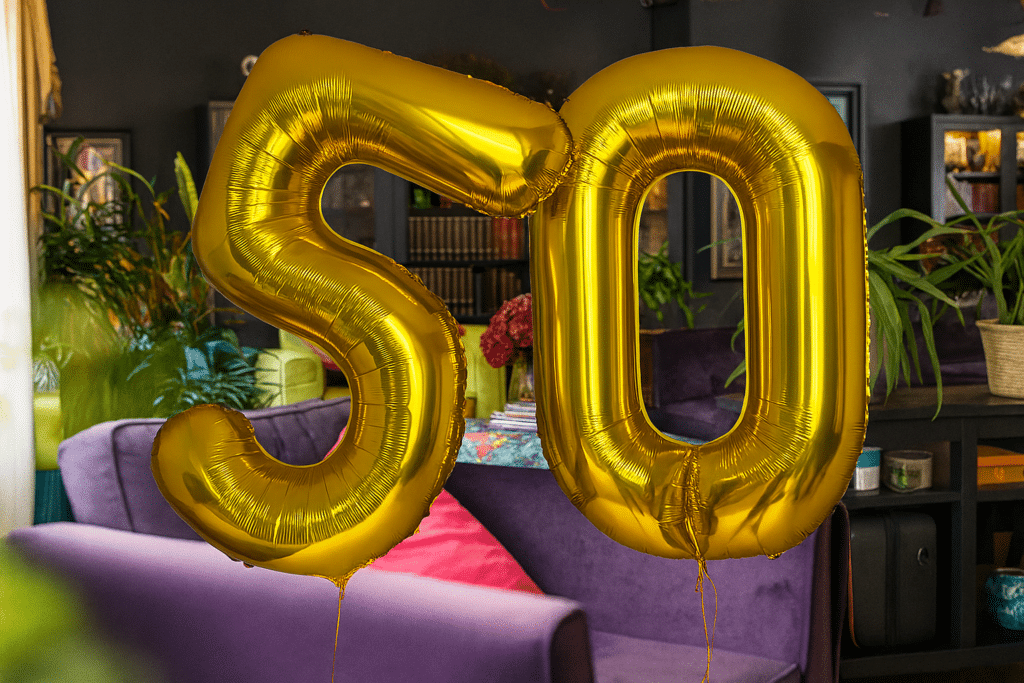 Why Turning 50 is Your Financial Wake Up Call - 50th Birthday balloon - Wellington Wealth